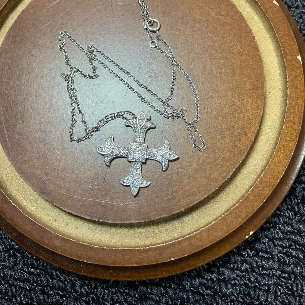 Sterling silver cross and chain, 18 inch. Gently worn.